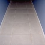 After staining and sealing of the grout lines.