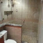 Frameless Shower Door With Kneewall