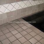 Tile countertop before cleaning & coloring grout
