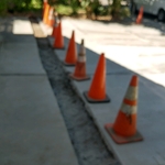 Sawcut and Jack-hammered across driveway
