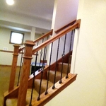 Square box newels with iron balusters