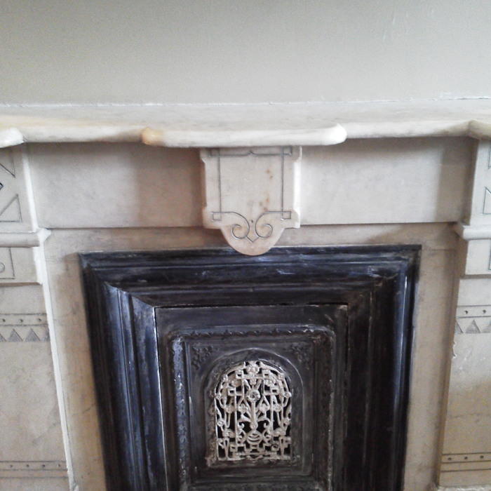 104 yr old marble fireplace w/stains & scratches