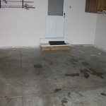 Before picture of a garage floor