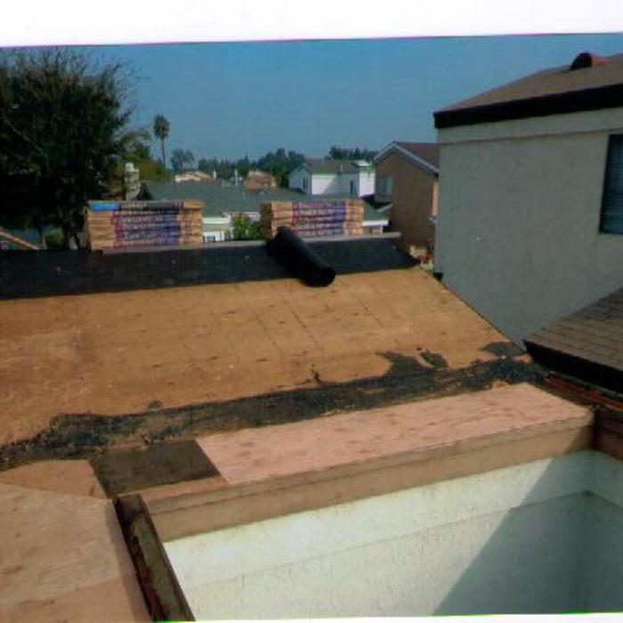 create slope on flat roof