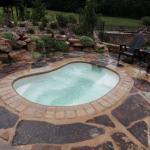 Traditional Pool - Open Rock Black Wrought Iron Fence
