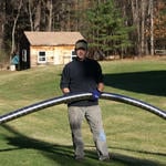 John Butler carrying a liner