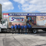 Movers in front of truck