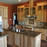 Natural tone kitchen with hickory cabinets