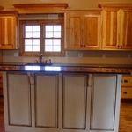 Front view island bar; staggered top cabinets