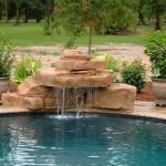Traditional Pool - Open Sunny Water Fall Feature Into Pool