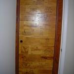 Custom door way to wine cellar