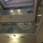 atrium to allow natural light but protect privacy