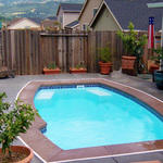 cozy and inviting patio with in ground pool