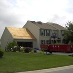 Removing existing roof.