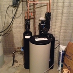 Water softener with brine tank showing drain