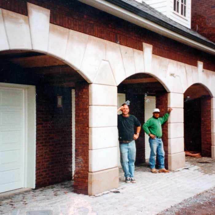 Limestone veneer, 3 car garage