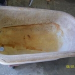 Clawfoot tub before restoration work