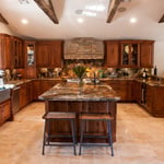 Granite Kitch Cntr With a Full Granite Back Splash