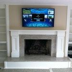 TV mount above fireplace