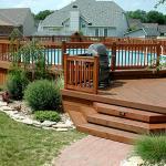 Transitional Deck - Red Blue Wood Railing Around Pool