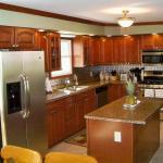 Transitional Kitchen - Tan Open Black And Silver Kitchen Appliances