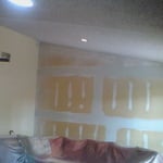 Wall paneling removed, retexured walls and paint.