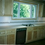 New kitchen cabinets,countertops,window,and tilewo