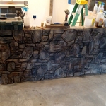Carved concrete stone wall