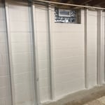 Tile, and reinforcement
