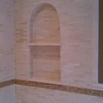 beautiful tiled bathroom with tiled niche