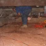 Crawlspace being cleaned