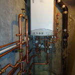 Boiler for domestic hot water and heating purposes