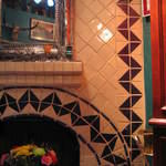 Talavera tile around the fireplace.