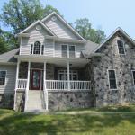 Traditional Home Exterior - Red Grey Stone And Siding Home