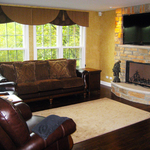 Media Room w/custom flat screen above fireplace