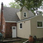 After! New Roof and Siding.