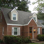 After! New Roof, Siding and Trim!