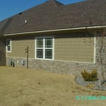 Shingle siding mixed with rock