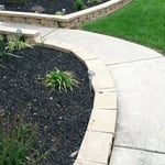 Retaining walls and flower beds