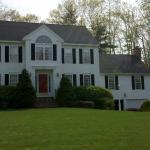 Traditional Home Exterior - Red Cozy Round Top Clerestory Windows