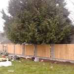 wood fence with brick