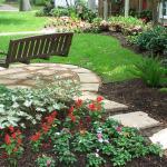 Traditional Garden - Garden Foliage Bench Swing Hanging From Tree