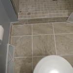Tiled floor and curb