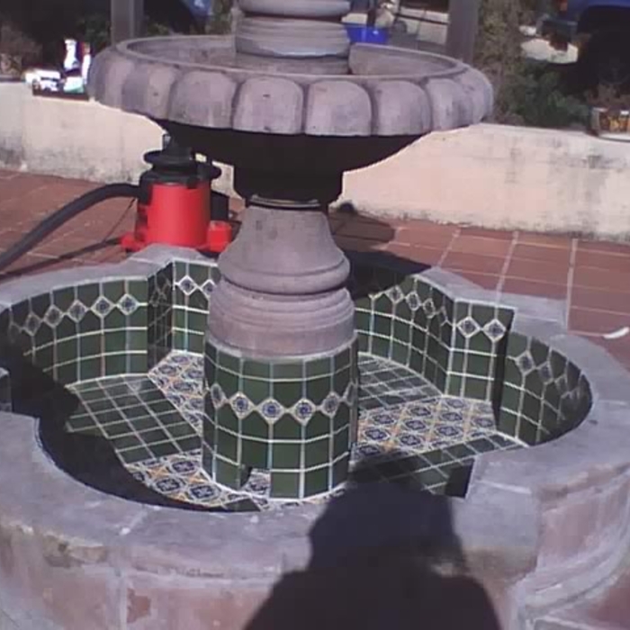 view of tile in fountain pond