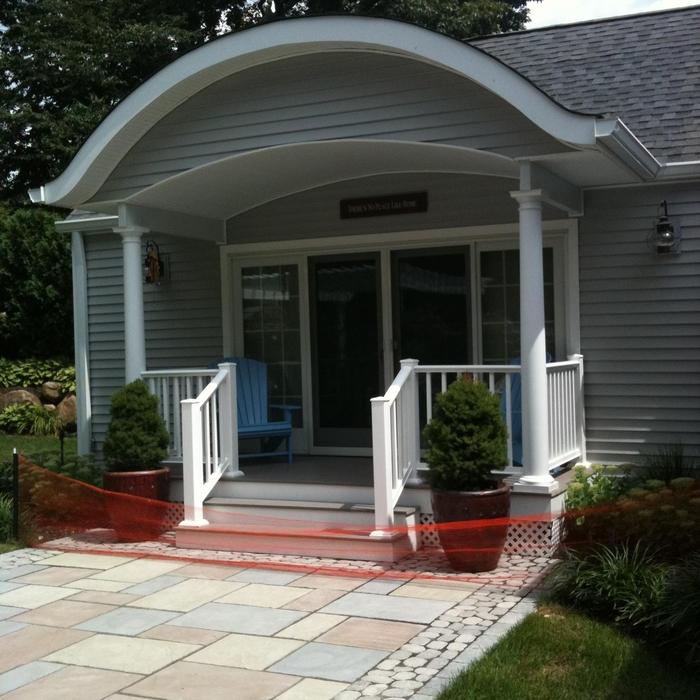 back porch with eyebrow roof