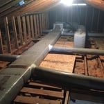 Attic Before - Fiberglass Insulation
