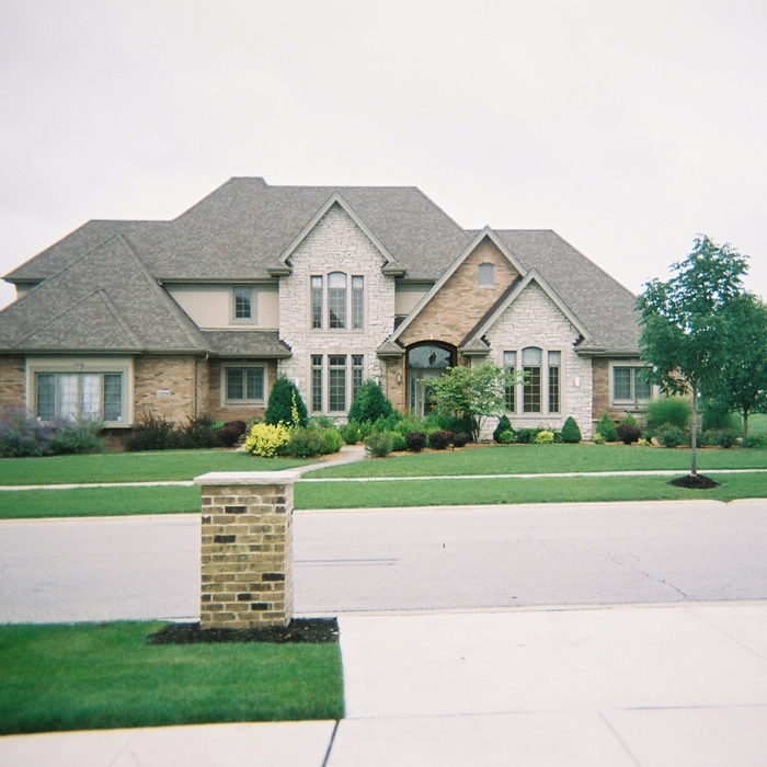 4000 sq. ft. brick 2 story, drivit 2nd flr