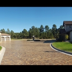 A beautiful neutral stone paver driveway