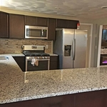 Water damaged living room and kitchen