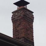Deteriorated Brick Chimney and cap